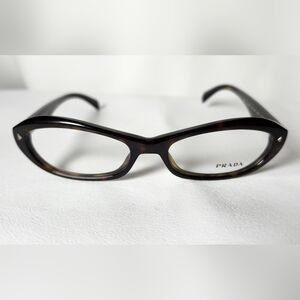 PRADA Eyeglasses brown tortoise coloring.